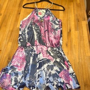 Beautiful pattern mini dress in blue/purple colors in a silk material.  size 2